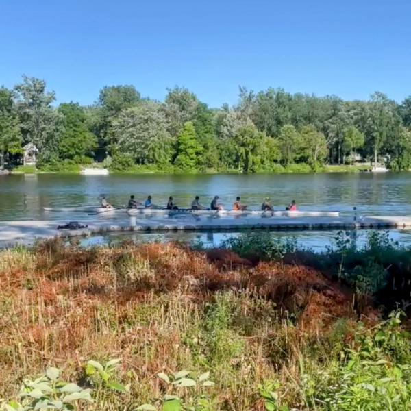 Phil C-B on the water in a boat.